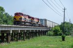 KCS 4012 crosses a low bridge north of Ganado, Texas